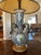 This majolica is a conversation piece! It is a large urn vase turned into a lamp. It is an antique from the Italian...