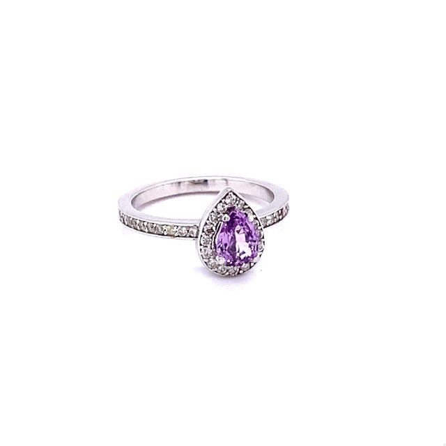 1.02 Carat Natural Pink Sapphire and Diamond Engagement Ring in 14 Karat White Gold This beautiful ring has a natural 0.82...