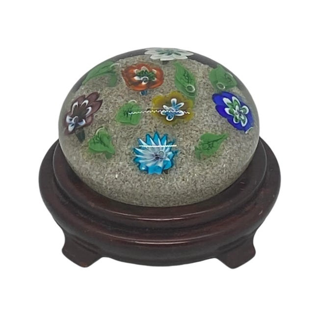 Beautiful vintage Ferro & Lazzarini Murano Italy Flower Garden Glass Paperweight with Round Wood Stand. I believe this...