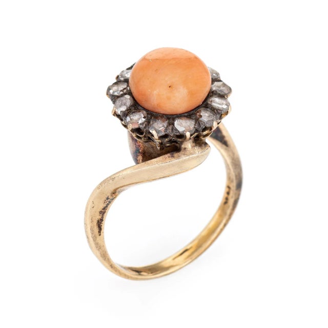 Stylish vintage coral ring (circa 1880s to 1900s) crafted in 14 karat yellow gold. Cabochon cut coral measures 9mm,...