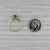 Gemstone Information: - Natural Sapphire - Carats - 0.50ct Cut - Round Color - Dark Blue Treatment - Heated Metal: 18k...