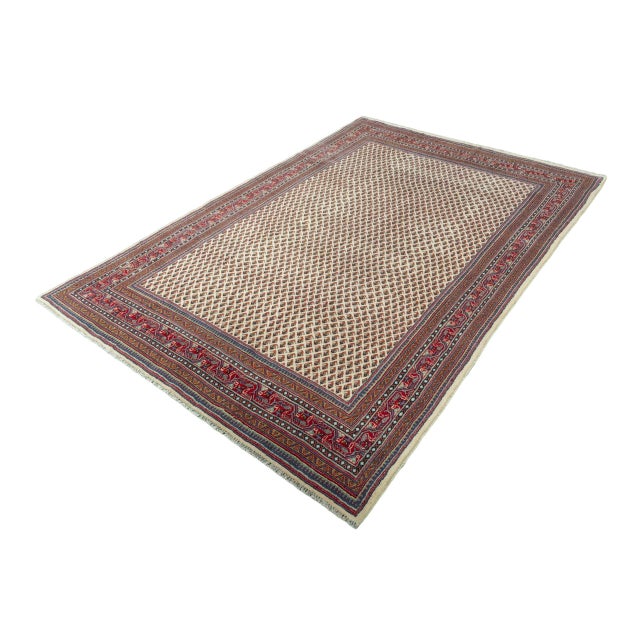 This beautiful Sarogh oriental rug measures 308 x 212 cm and features a finely crafted grid pattern that evenly fills the...