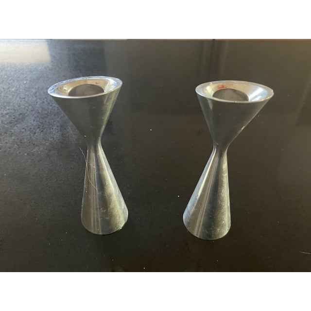 1994 Nambé ‘Nova’ Candlestick 6046 by Karin Rashid. This is one of the earliest Karim Rashid collaborations with Nambé...