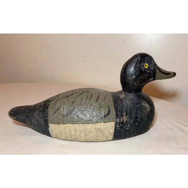 Up for sale is a wonderful vintage hand carved wooden bluebill drake duck decoy sculpture. It is beautifully carved with...