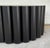Original retail $1911, stylish Noir Company Modern Black Steel Scalloped Rose Coffee Table, showroom floor sample