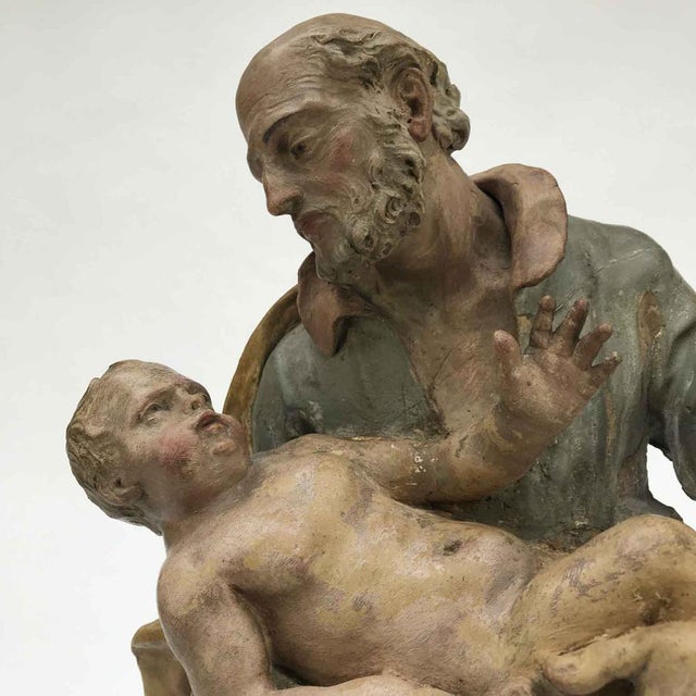 A terracotta Saint Joseph with Child, a fine example of Bolognese sculpture from the 1700s, from the circle of Angelo...
