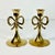 Vintage Home is pleased to offer this pair of Chippendale style Brass Bow Candlestick Holders. The early Mid-Century pair...