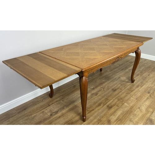 A beautifully crafted Vintage French Louis dining table , showcasing elegant proportions and classic French styling. The...