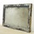 Reclaimed rectangular shaped window with a wood frame, steel sides, and a clear wormy chicken wire glass pane. It was...