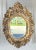 Wood Vintage Large Solid Carved Wood Gold Gilt Oval Hollywood Regency Wall Mirror For Sale - Image 7 of 8