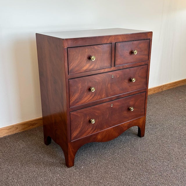 Wright Table Company Flamed Mahogany 4 Drawer Bachelor's Chest This Chest was made my the Wright Table Company, a company...