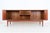 1960s-1970s, Bernhard Pedersen, Denmark. Very high-quality workmanship. Teak (veneer and solid parts). with roller shutter...