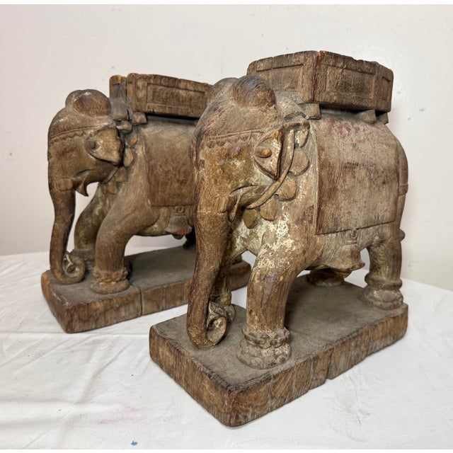 Up for sale is a stunning pair of antique 18th century hand carved wooden elephant sculptures that were an architectural...
