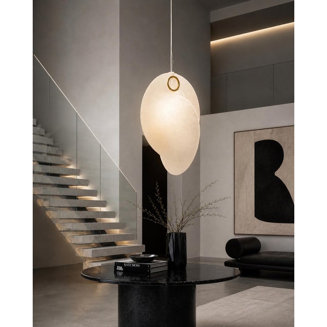 An exceptional Overlap S1 pendant light designed by Michael Anastassiades and manufactured in Italy by Flos. This...