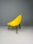 Sculptural lounge chair designed by Ed Mérat, featuring a vibrant yellow molded fiberglass shell with an elegant, organic...