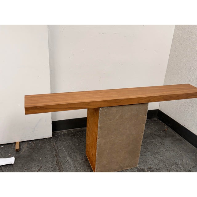 Design Plus Gallery presents the Float Wall Shelf from Room & Board. The shelf has a streamlined walnut profile and a...