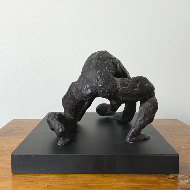 Joseph J. Greenberg Jr. (1915-1991) - Resin, signed on base. Moddled sculpture of a man bent in frustration. Sculpture is...