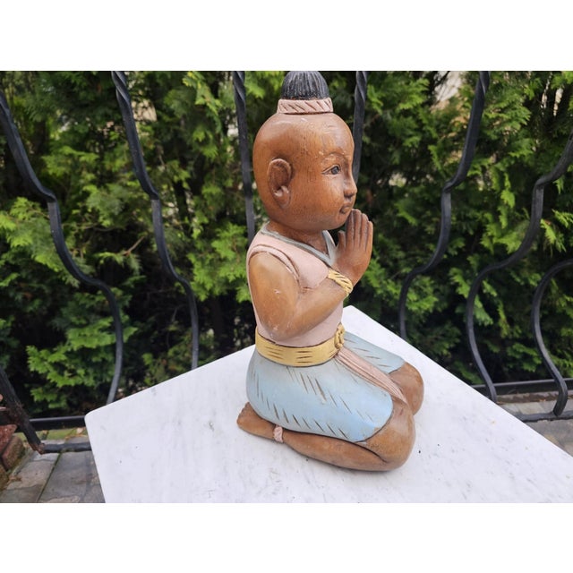 Buddha, wooden, 1950s-1960s, dimensions: height 38 cm, width 15 cm, depth 21 cm.