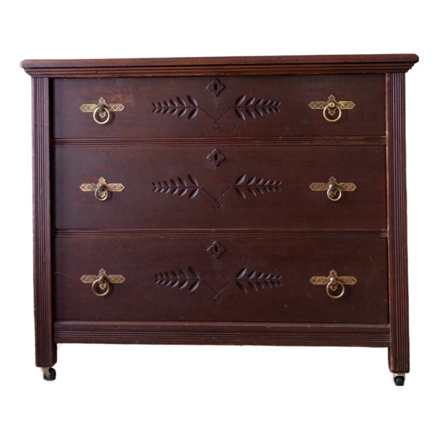 Antique Chest of Drawers With Eastlake Carvings and Brass Hardware For Sale