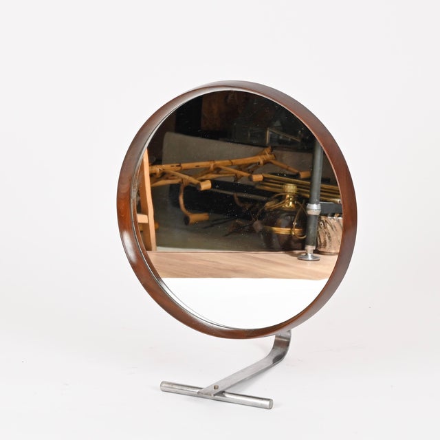 Marvelous and unique large Mid-Century adjustable table mirror crafted in solid teak and brushed steel. This elegant piece...