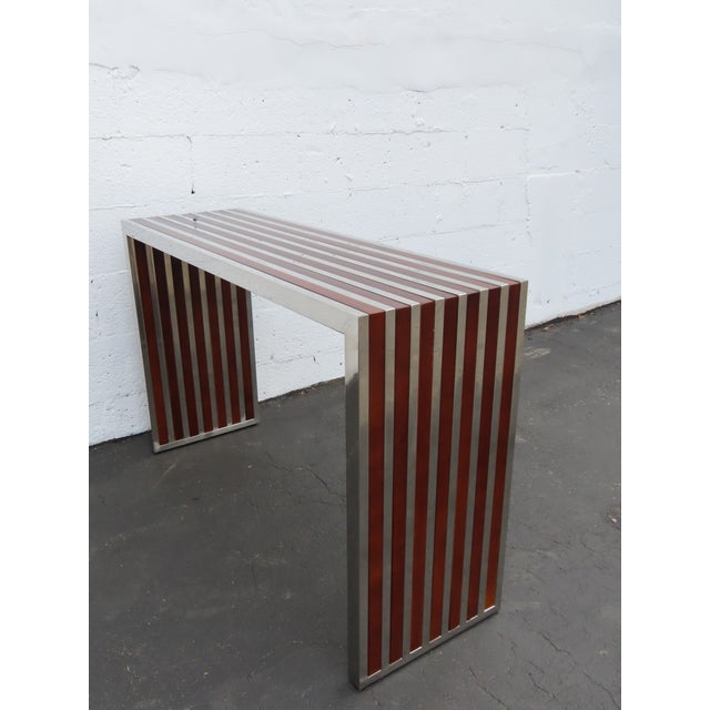 This beautiful Console Library Table is made out of solid wood, metal, and it is in good condition. This Console Table has...