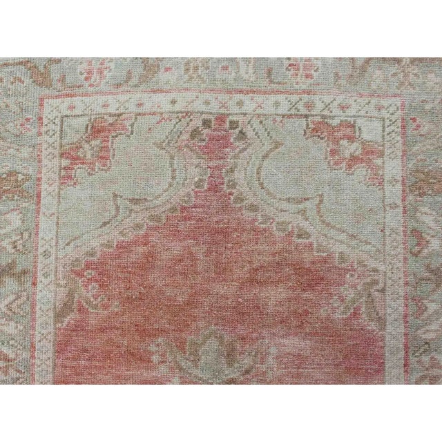 Textile Vintage Turkish Oushak Medallion Rug in Soft Coral, Mint Green, and Beige Tones For Sale - Image 7 of 13