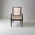 A De Coene Freres designed Art Deco period armchair from Belgium circa 1930. Black lacquer finish with patinated bronze...
