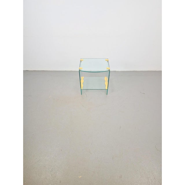 Vintage side table brass glass side table regency '70s This Design side table is made of glass and brass Very nicely...