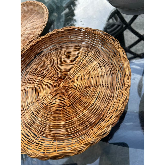Up for consideration is a beautiful vintage pair of wicker decorative plates. These would look lovely in your home, and...