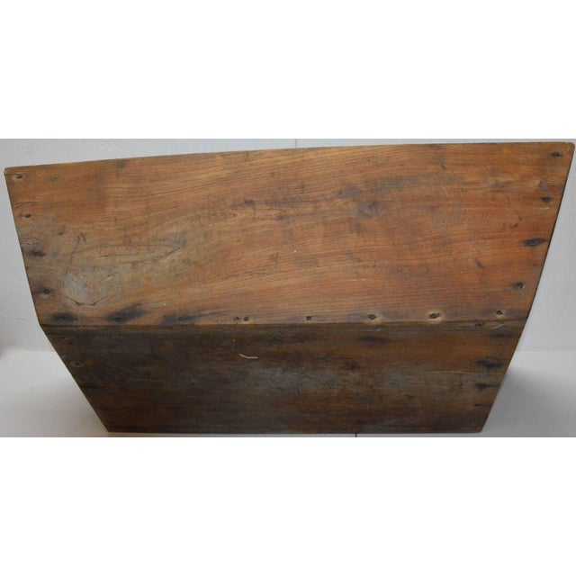 This is an unfinished Primitive style trough constructed of walnut with angled sides and completed with nails. This would...