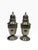 A highly elegant, complete pair of solid sterling silver salt and pepper shakers (muffineers) by the legendary American...