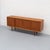 Clean-lined Danish sideboard designed by Axel Christensen for ACO Møbler, produced in Denmark during the 1960s. Crafted in...