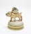 Lidded Container – Bull Dog with Friends transforms a functional porcelain vessel into a whimsical sculptural scene,...