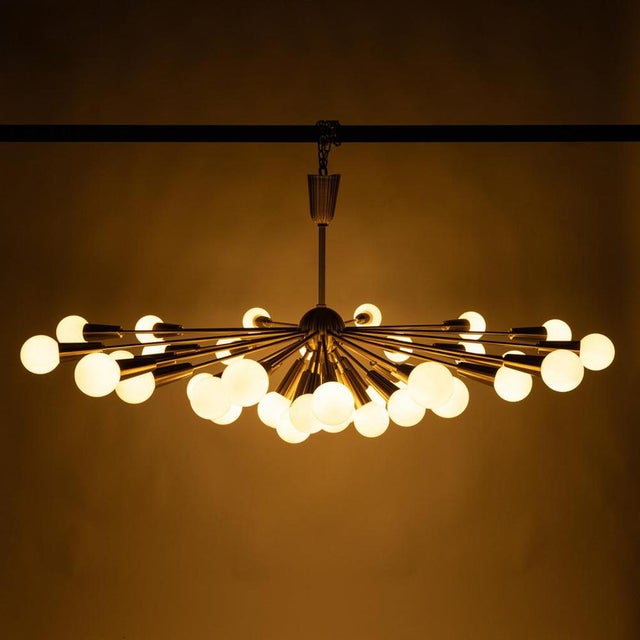 This spectacular hanging chandelier was designed in the 1970s by Jaroslav Bejvl for the Kamenický Šenov factory. The town...