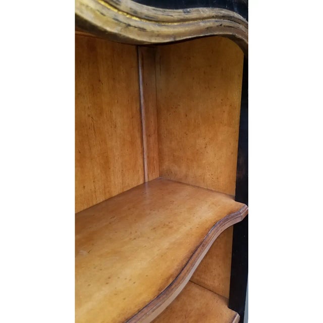 Featured is a lovely Louis XV Style Solid Wood Bibliotheque characterized by solid wood construction and corresponding...