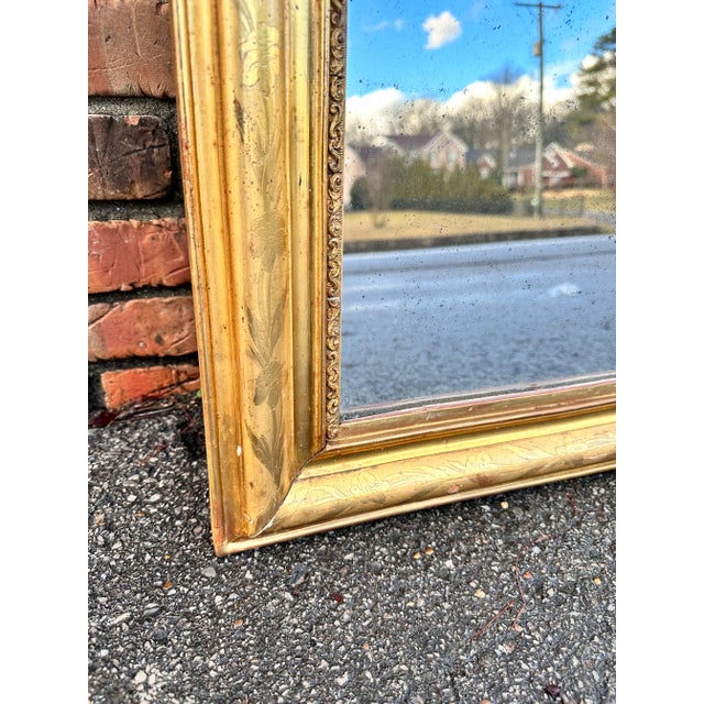 This is a beautiful 19th century French Louis Philippe Mirror. The outer border features a lovely floral leaf pattern,...