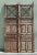 Monumental antique Indian courtyard gates crafted from solid hardwood with hand-forged iron spindle work and original...