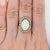 Celebrate in style with this stunning 4.98ct opal ring! Crafted from solid 14k yellow gold & accented with natural diamond...
