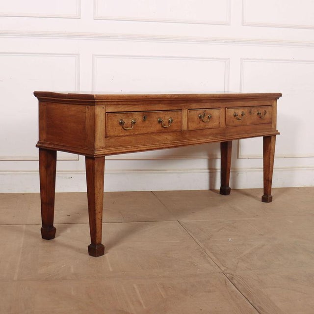 Stunning 18th Century English fruitwood 3 drawer dresser base with a wonderful colour. 1770 This piece is designed in the...