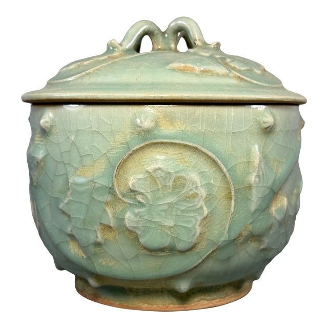 Antique Chinese Official‑Style Celadon Lidded Jar With Relief Floral Motifs For Sale