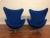 Authentic Arne Jacobsen for Fritz Hansen pair of egg chairs. This vintage pair sport gorgeous, vibrant blue fabric, but...