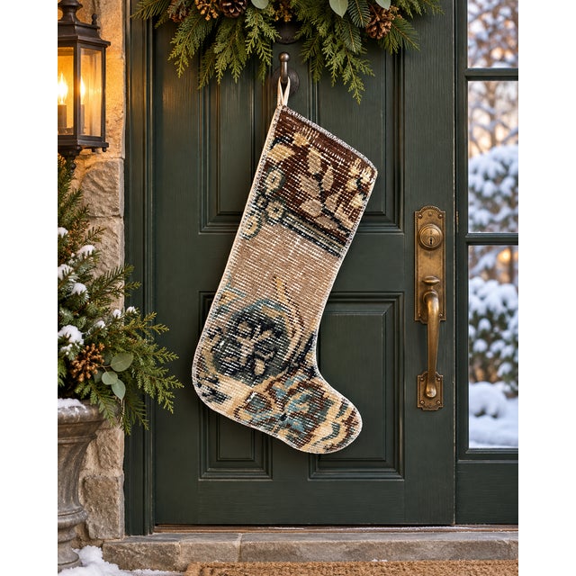 This one-of-a-kind Christmas stocking is hand-altered from an authentic vintage Turkish rug, hand-knotted in wool circa...