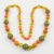 Plastic Bakelite and Lucite Necklace Extra Long Shape Orange Green and Glitter Beads For Sale - Image 7 of 12