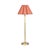 The Polly Buffet Table Lamp showcases sophistication with its single scalloped shade, casting a warm and inviting glow...