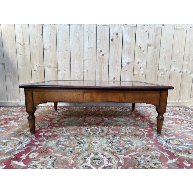 Rectangular coffee table in solid cherry and oak, dating from the 1980s, beautifully crafted in the classic French style....