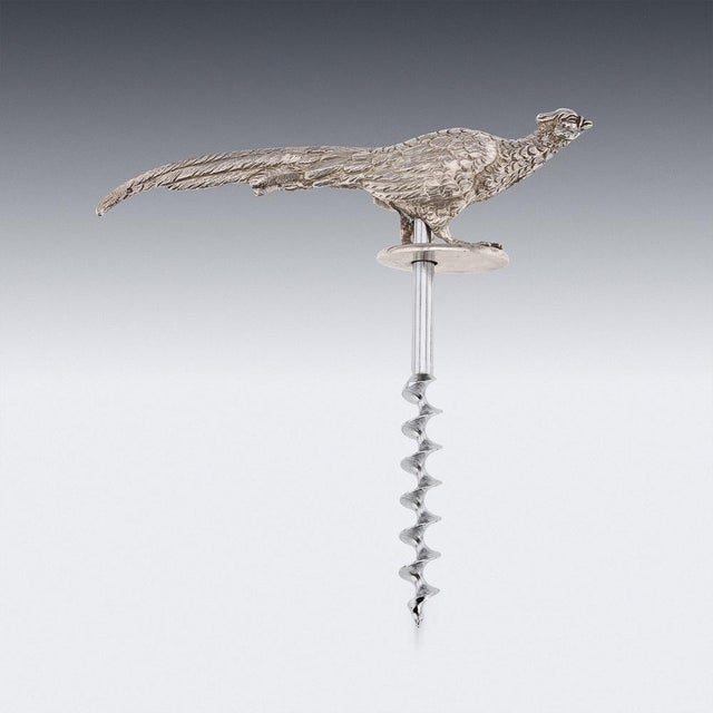 A late 20th century rare novelty solid silver corkscrew in the shape of an pheasant in its original presentation box. A...