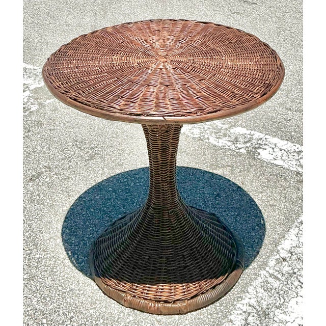 This exquisite vintage drinks table is a masterclass in organic modernism and artisanal weaving. Featuring a striking...