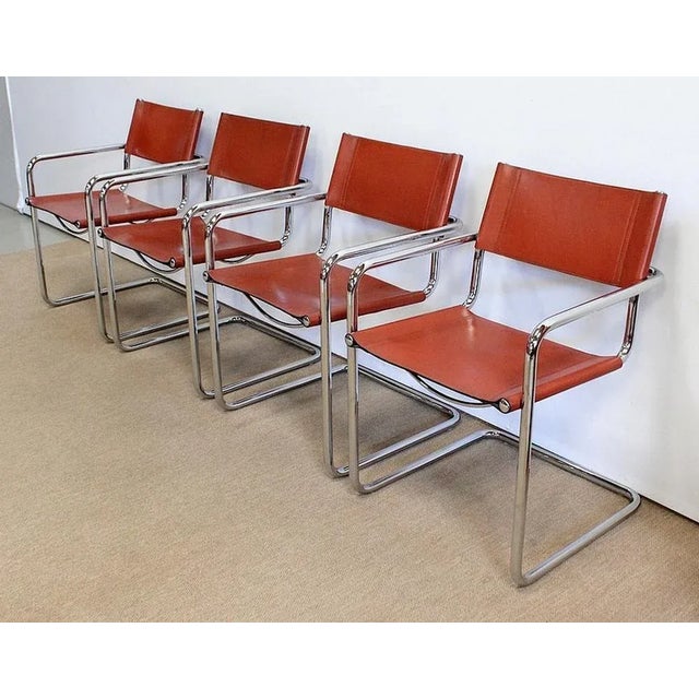 Set of four chrome metal chairs taking the B34 model of Marcel Breuer, reissued by the architects of the Centro Studi for...