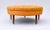 An unusual custom Mid Century Modern tufted ottoman in vibrant Sunflower raw silk upholstery with Walnut tapered legs....
