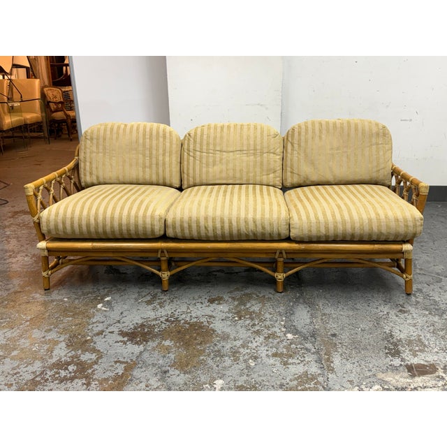 Design Plus Gallery presents a Vintage Cathedral Three Seater Sofa from McGuire Furniture. This vintage sofa shows the...